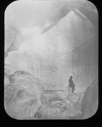Image of Man standing on iceberg